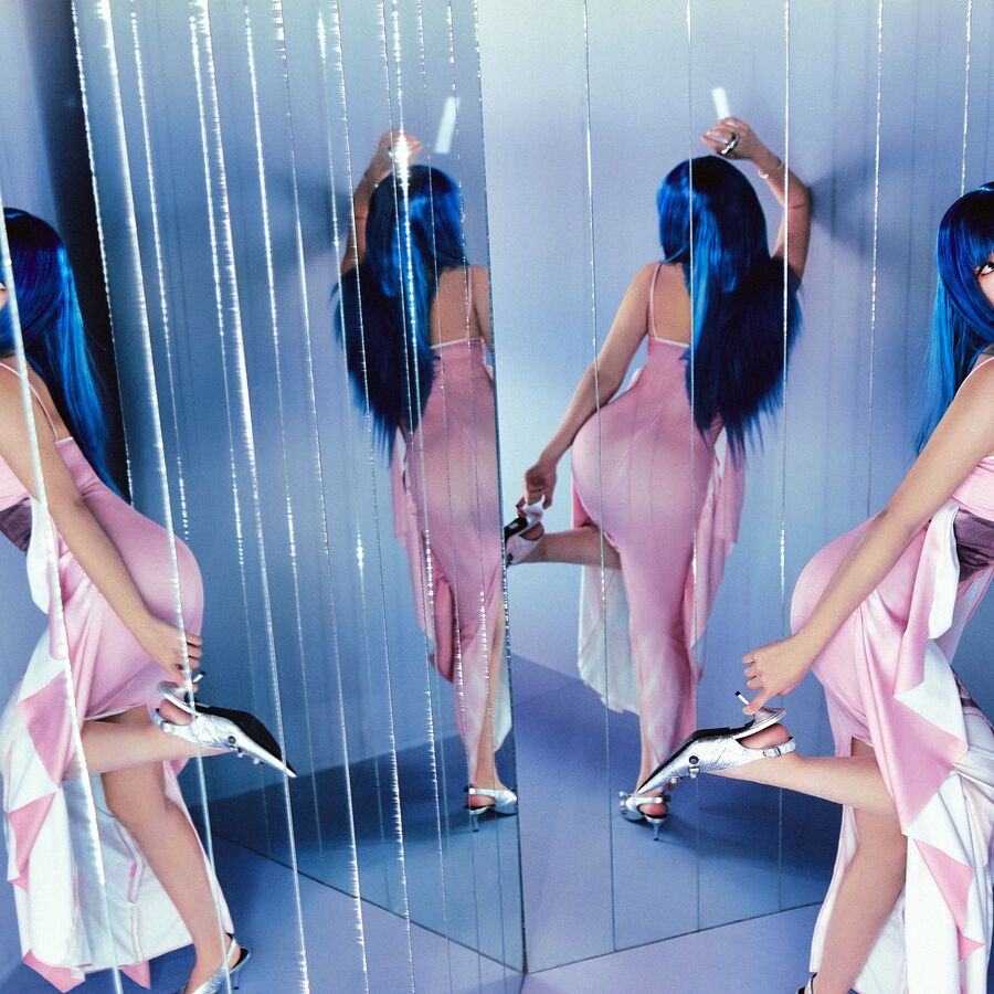 BIBI poses in mirrors for her new album, Eve: Romance